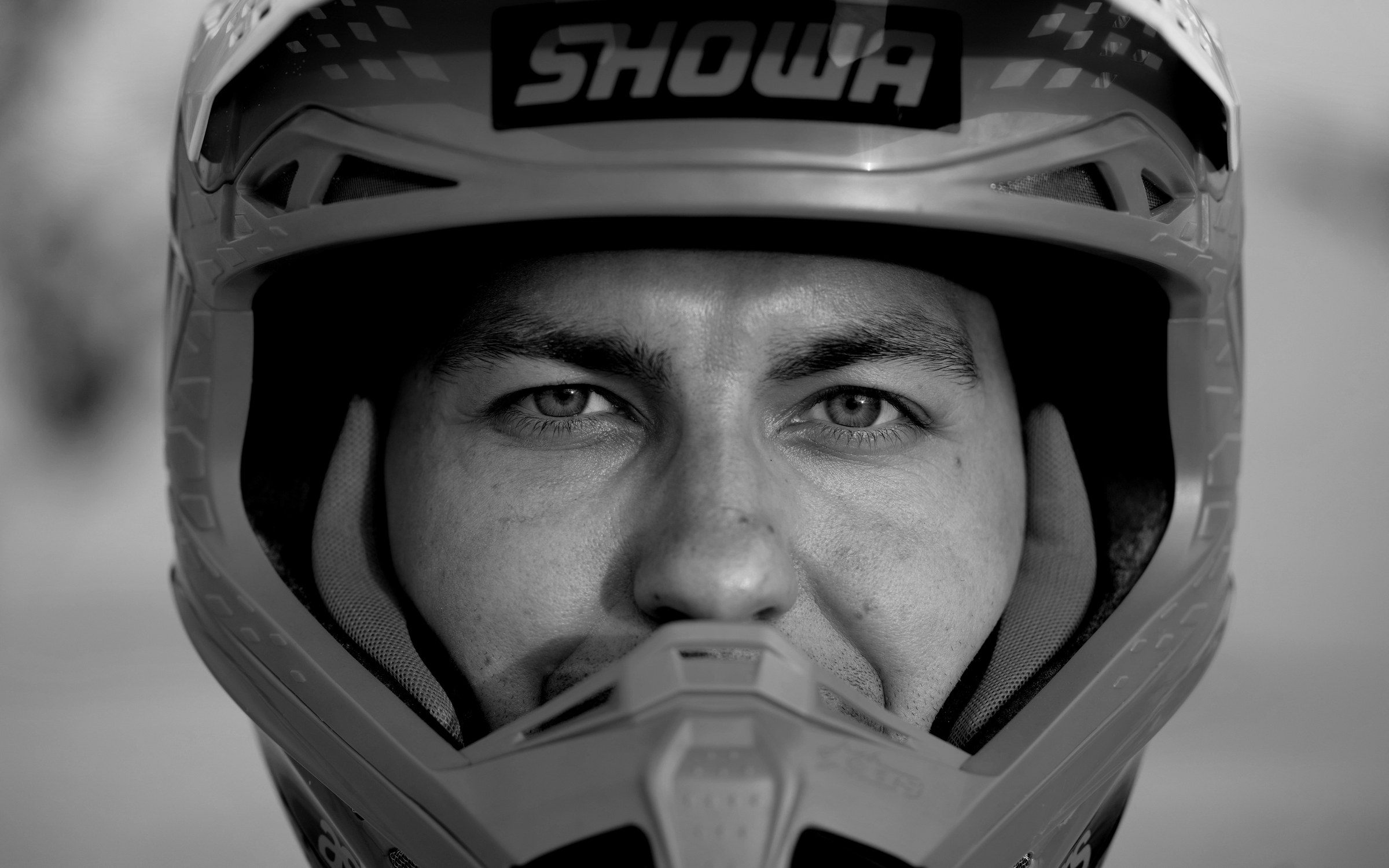 Rider in a SHOWA motocross helmet